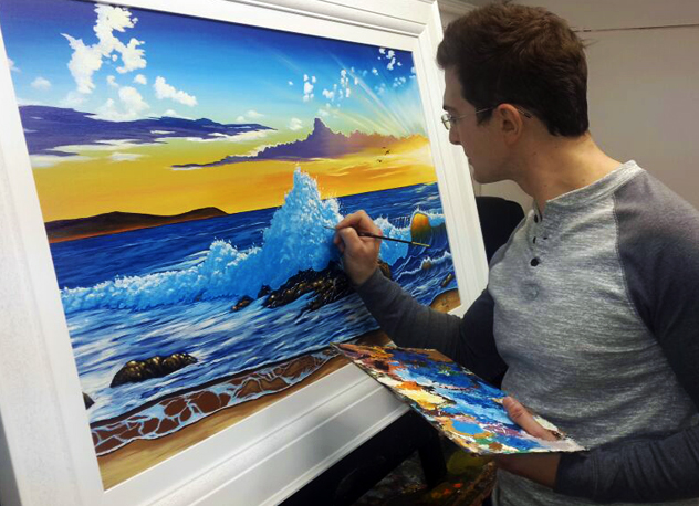 Nicky van Rensburg painting a seascape